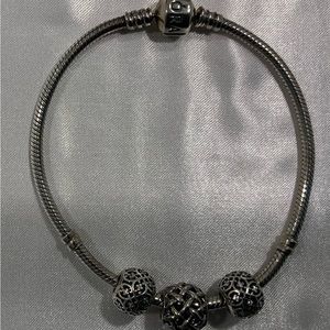Pandora bracelet with 3 charms
